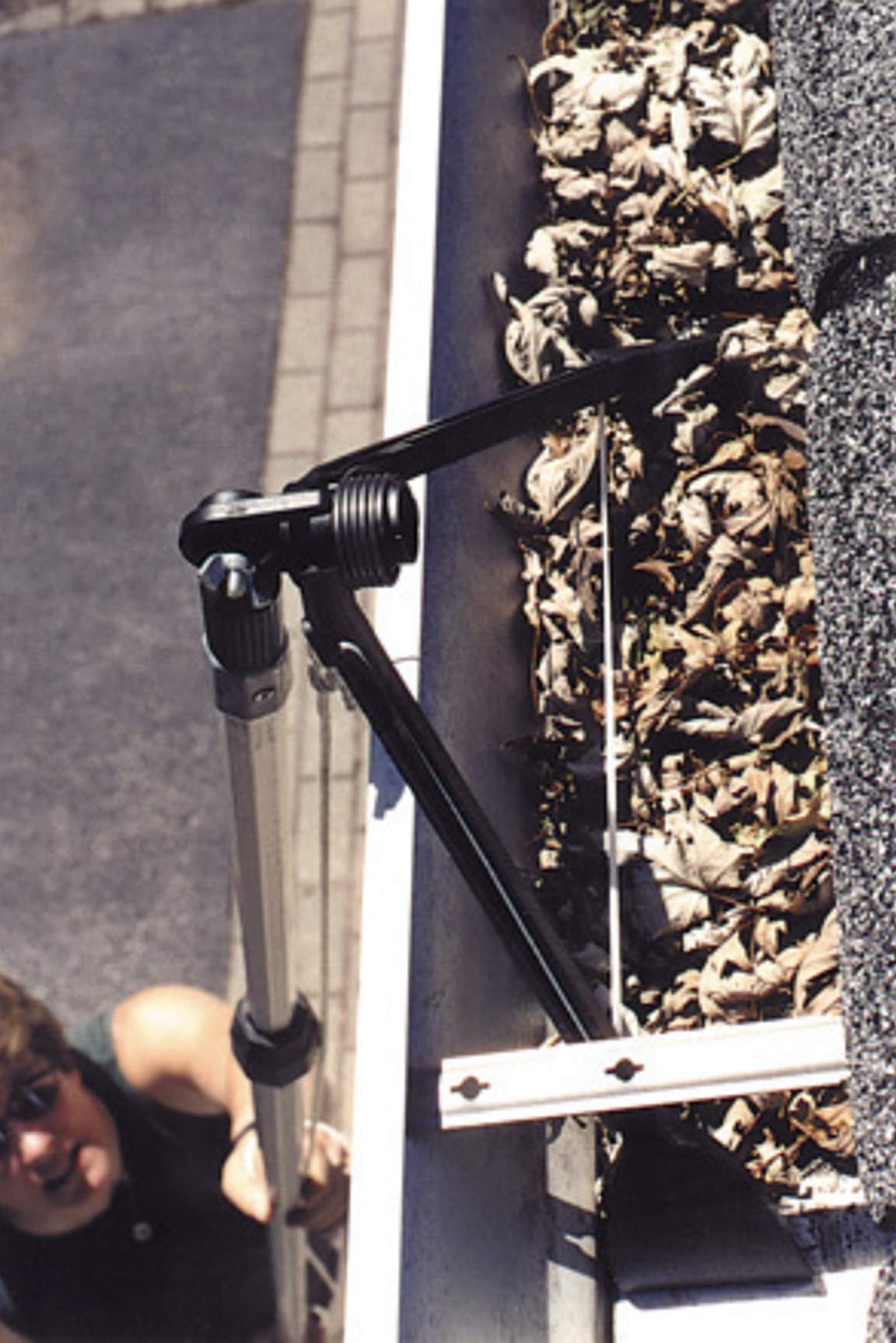 Gutter Sense Gutter Cleaning Tool 14-wide grasp broadens gutter reach.