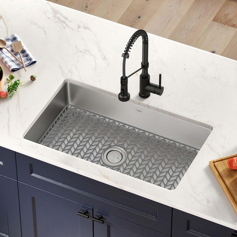 GUUKIN grey mat blends with farmhouse sinks and modern kitchens.