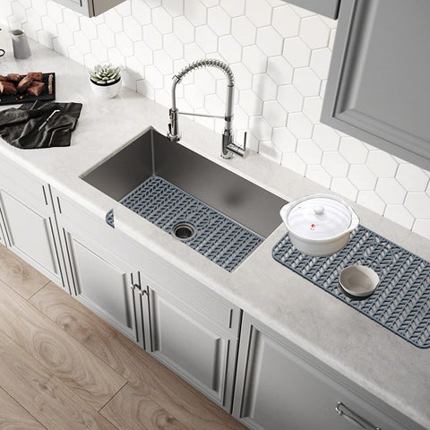 GUUKIN grey grid mat fits farmhouse sinks with a modern look.