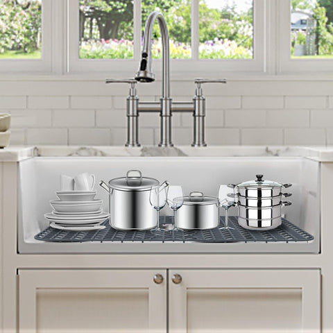 GUUKIN grey sink mat blends with contemporary kitchen decor.