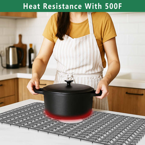 GUUKIN sink mat center drain keeps water flowing and reduces pooling.