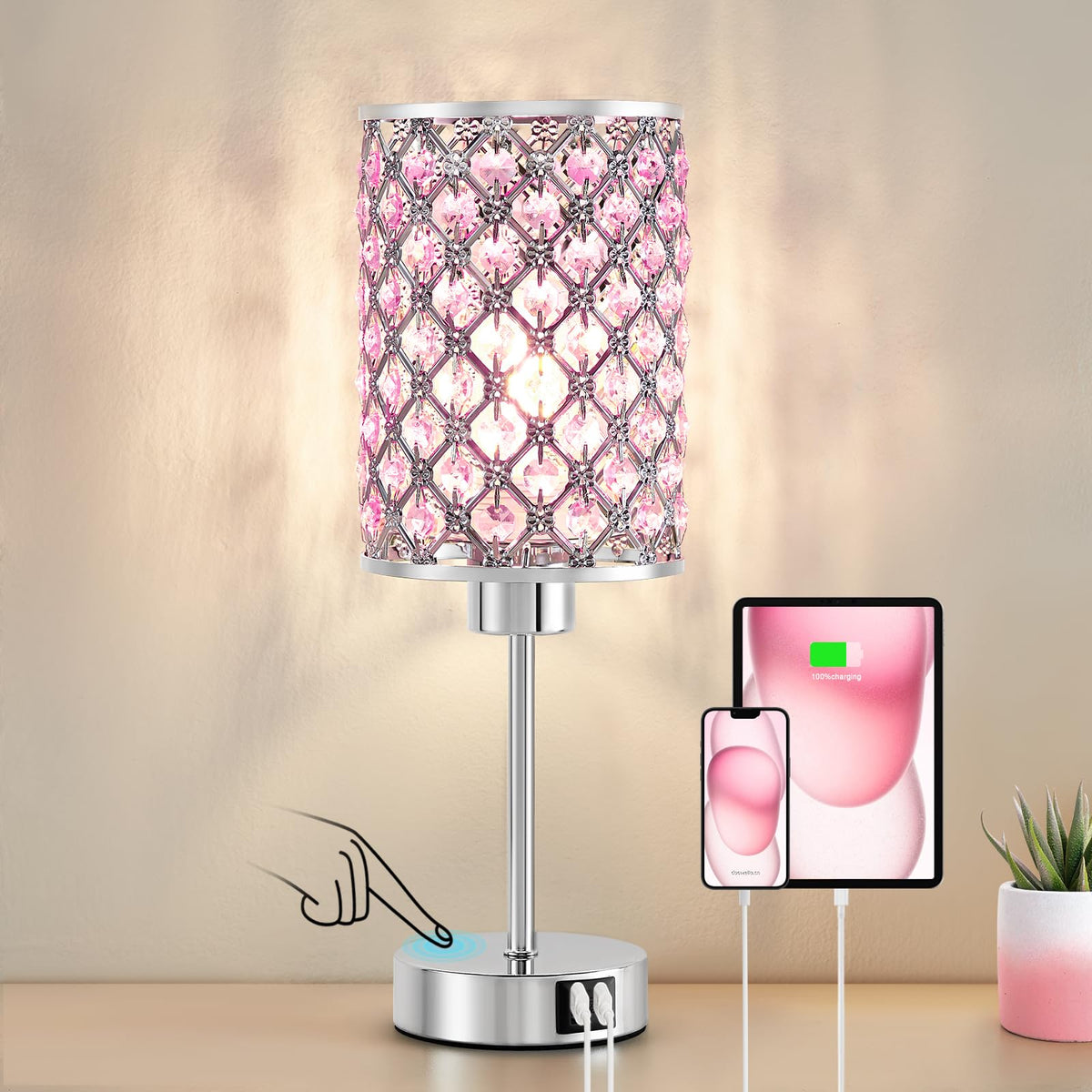 GyroVu crystal table lamp with pink touch panel emitting soft ambient light.