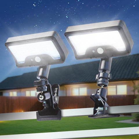 HAARAY solar clip-on fence light illuminating fences and decks with flexible mounting