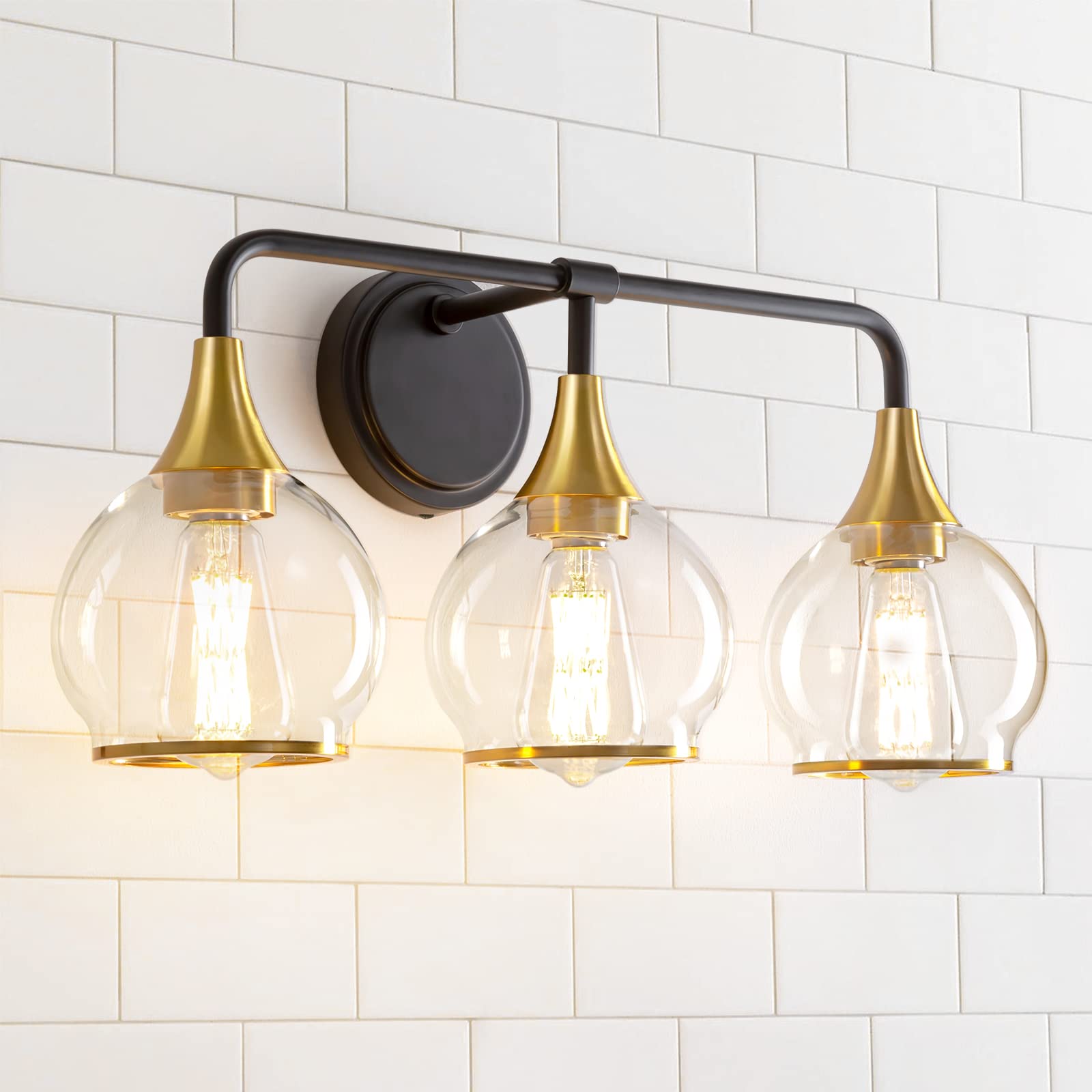 HAHZT black and gold vanity light over-mirror with clear glass shades enhances contemporary bathrooms