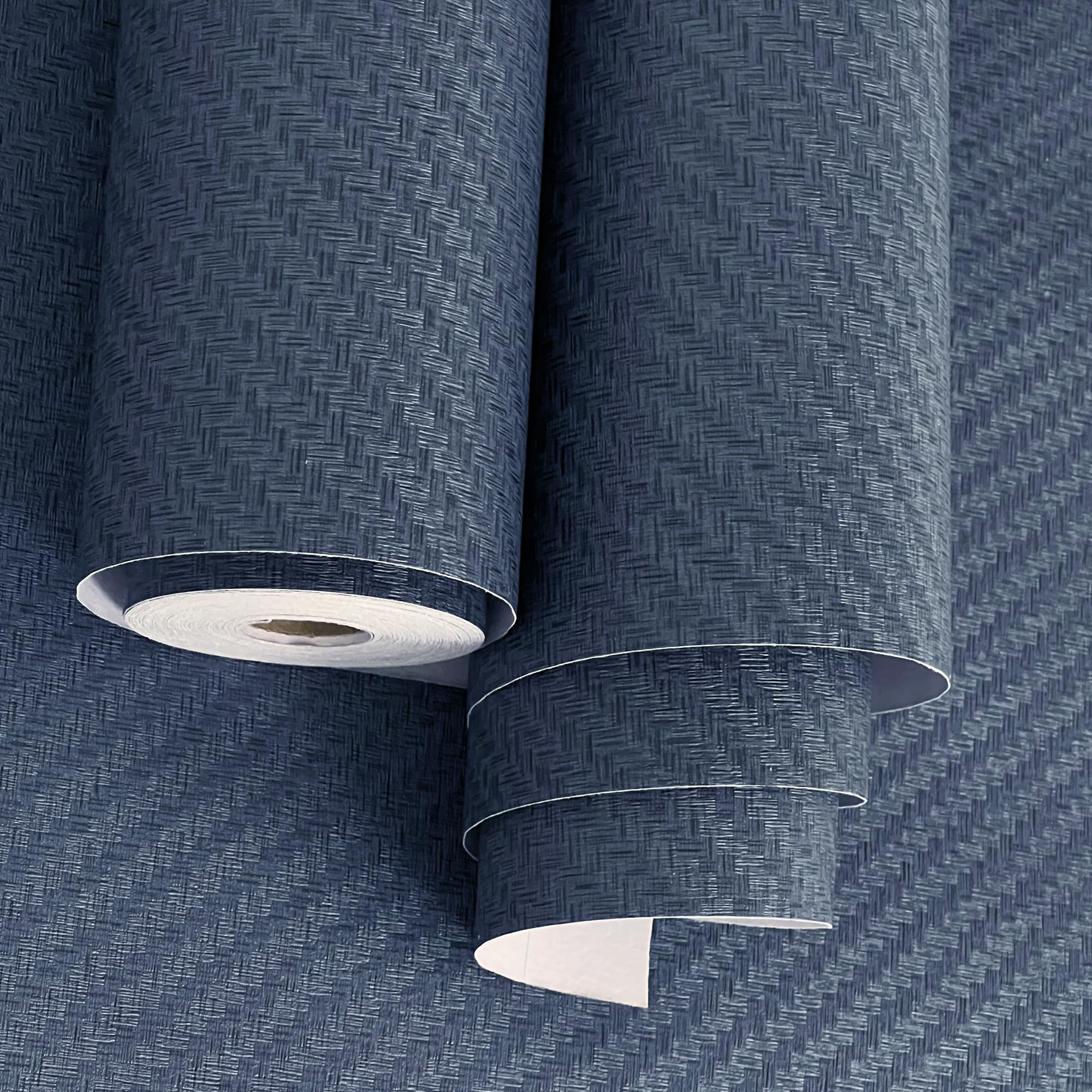 Haimin fabric wallpaper navy grasscloth roll adds subtle wall texture.
