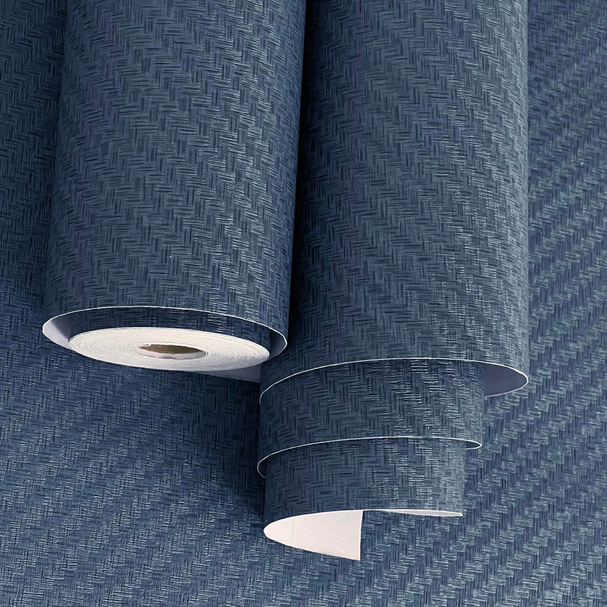 Haimin fabric wallpaper navy grasscloth roll adds subtle wall texture.