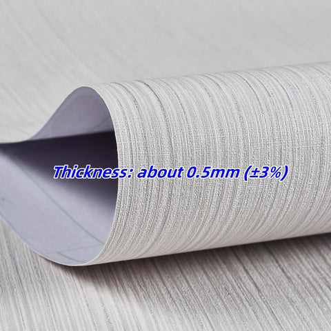 Haimin wallpaper DIY application on furniture illustrates peel-and-stick convenience.