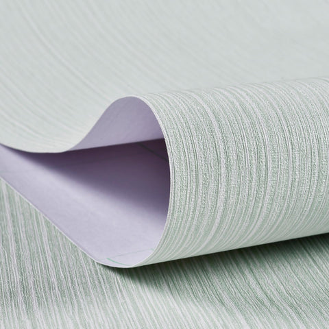 Haimin Grasscloth wallpaper back grid aids precise cutting during installation.