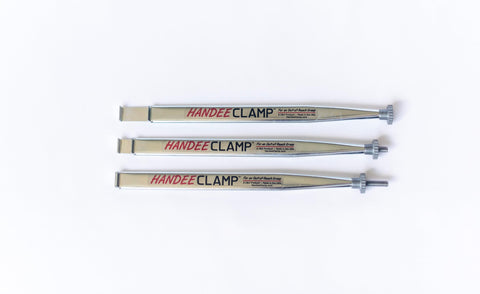 Handee Clamp compressing a gas line clamp for a secure connection