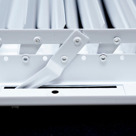 Quiet operation shown with a clean Handua vent cover in a room.