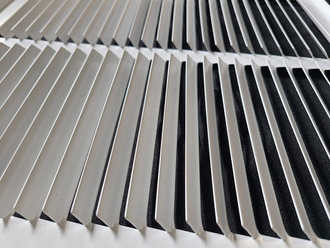 Handua grille designed for sidewall or ceiling openings with clean look