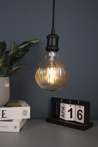 Harwez mercury-free, flicker-free decorative bulb for calm ambiance.