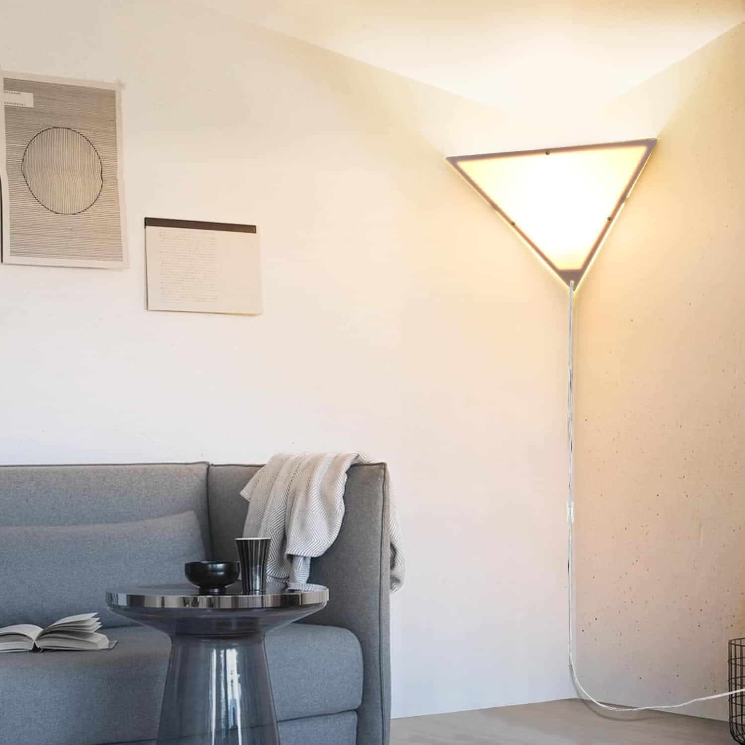Haultop corner light triangle frame emits soft ambient glow in living room.