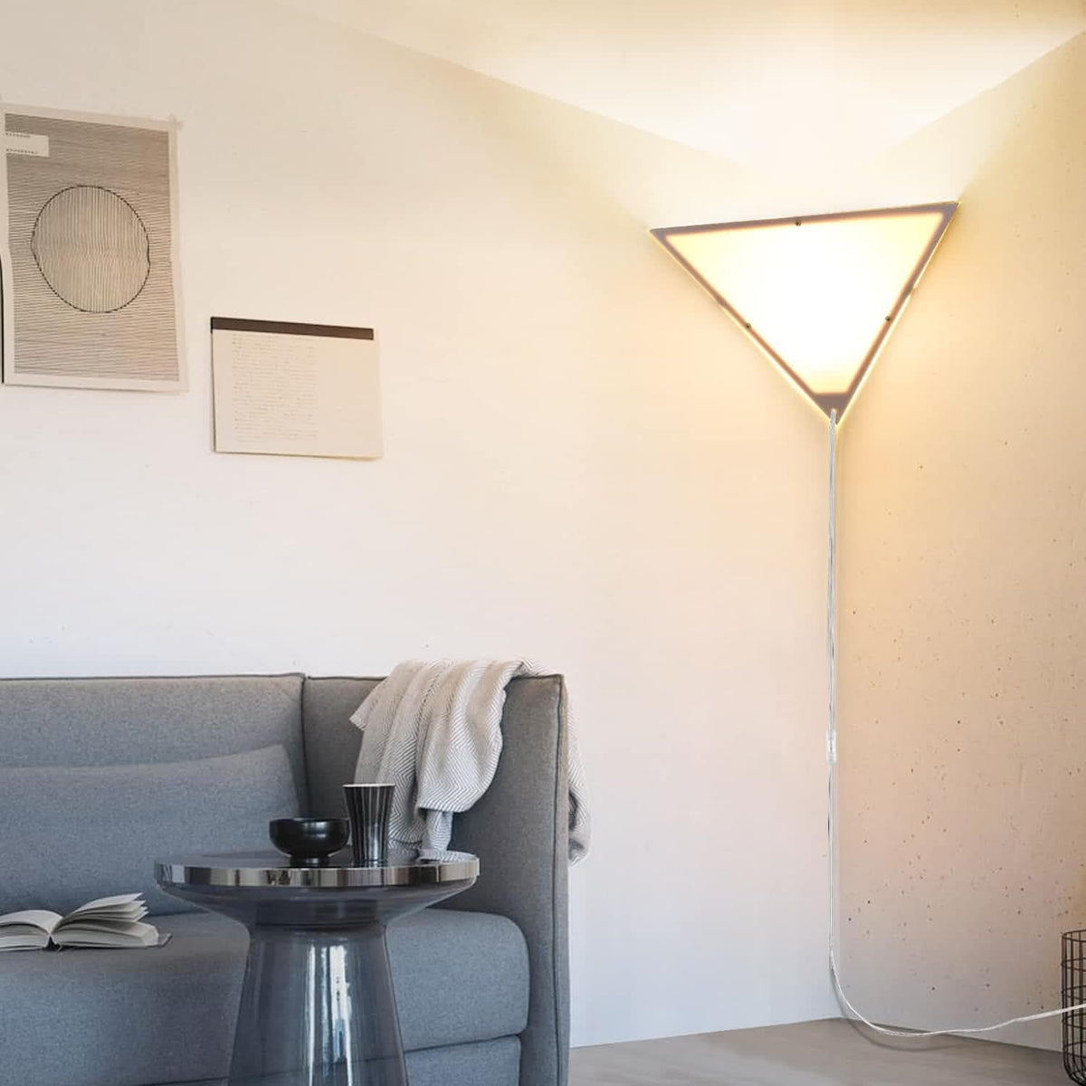 Haultop corner light triangle frame emits soft ambient glow in living room.