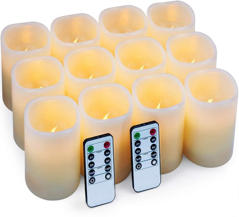 Hausware flameless ivory pillar candles illuminate a table with ambient glow.