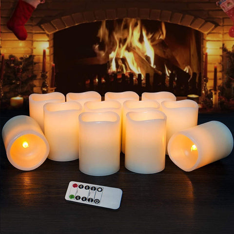 Hausware ivory pillar candles with remote control for easy operation.