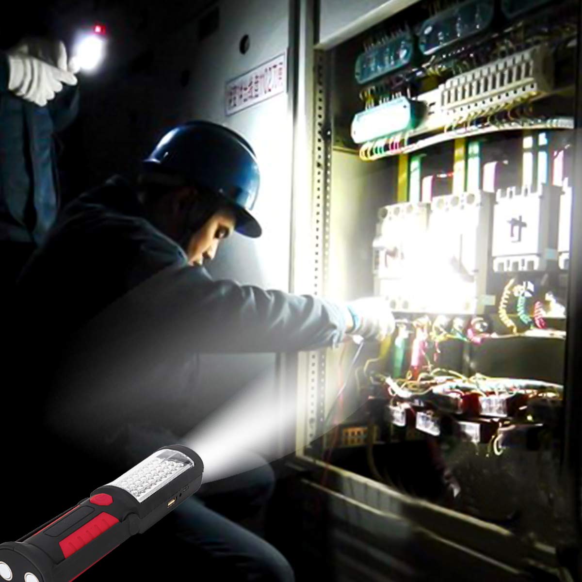 Red HEDAQI emergency light close-up highlighting compact size and visibility.