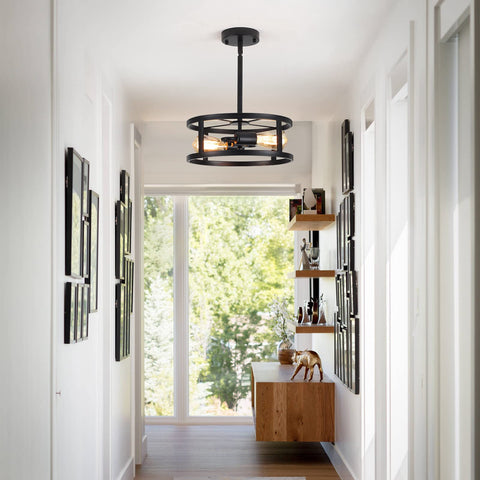 Heircido fixture with two rotating track heads for adjustable light direction.
