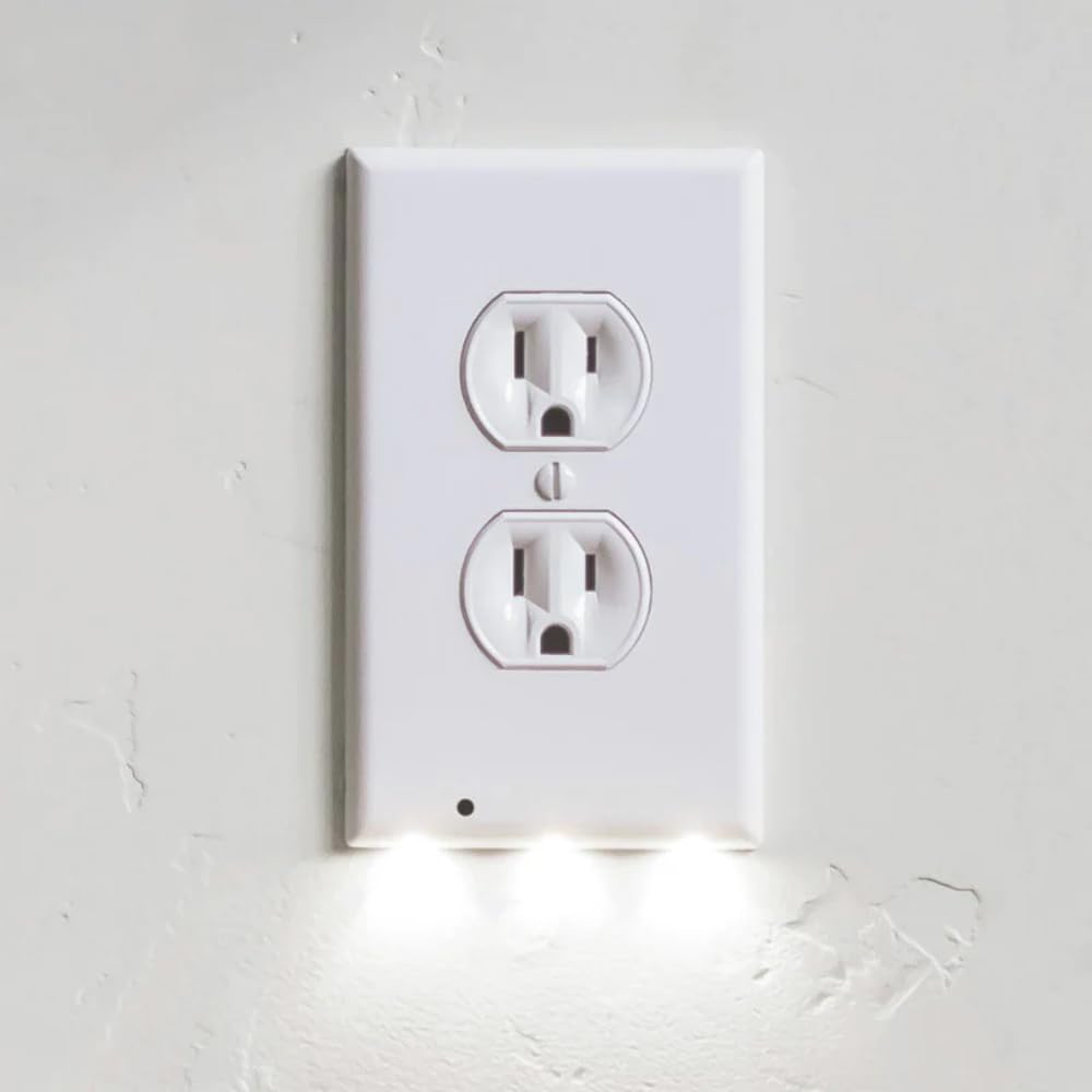 Hello Light wall plate night light emits a gentle ambient glow from a duplex outlet.