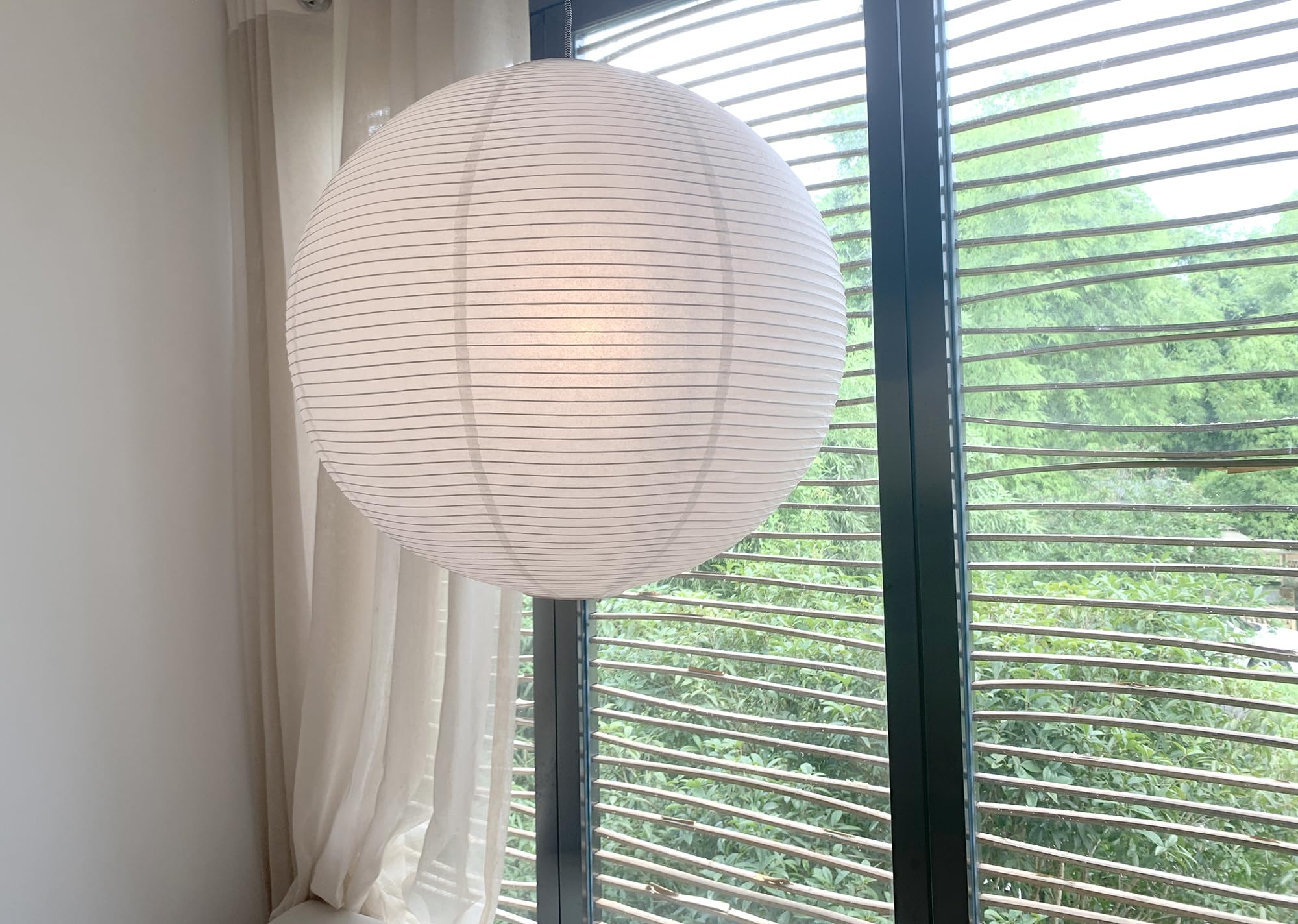 Henjjras paper lampshade close-up reveals delicate texture and craftsmanship