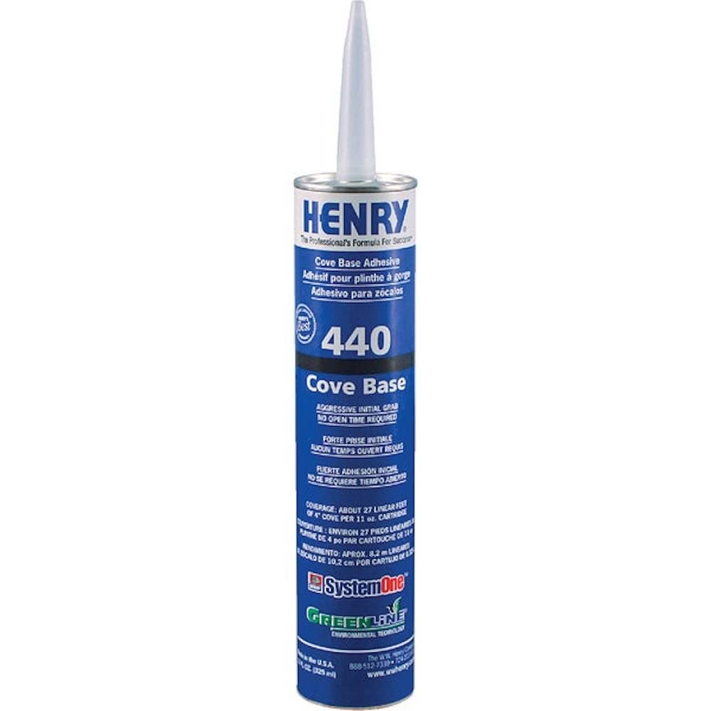 Henry Hentry Cove Base Adhesive in use on a wall showing strong initial grab.