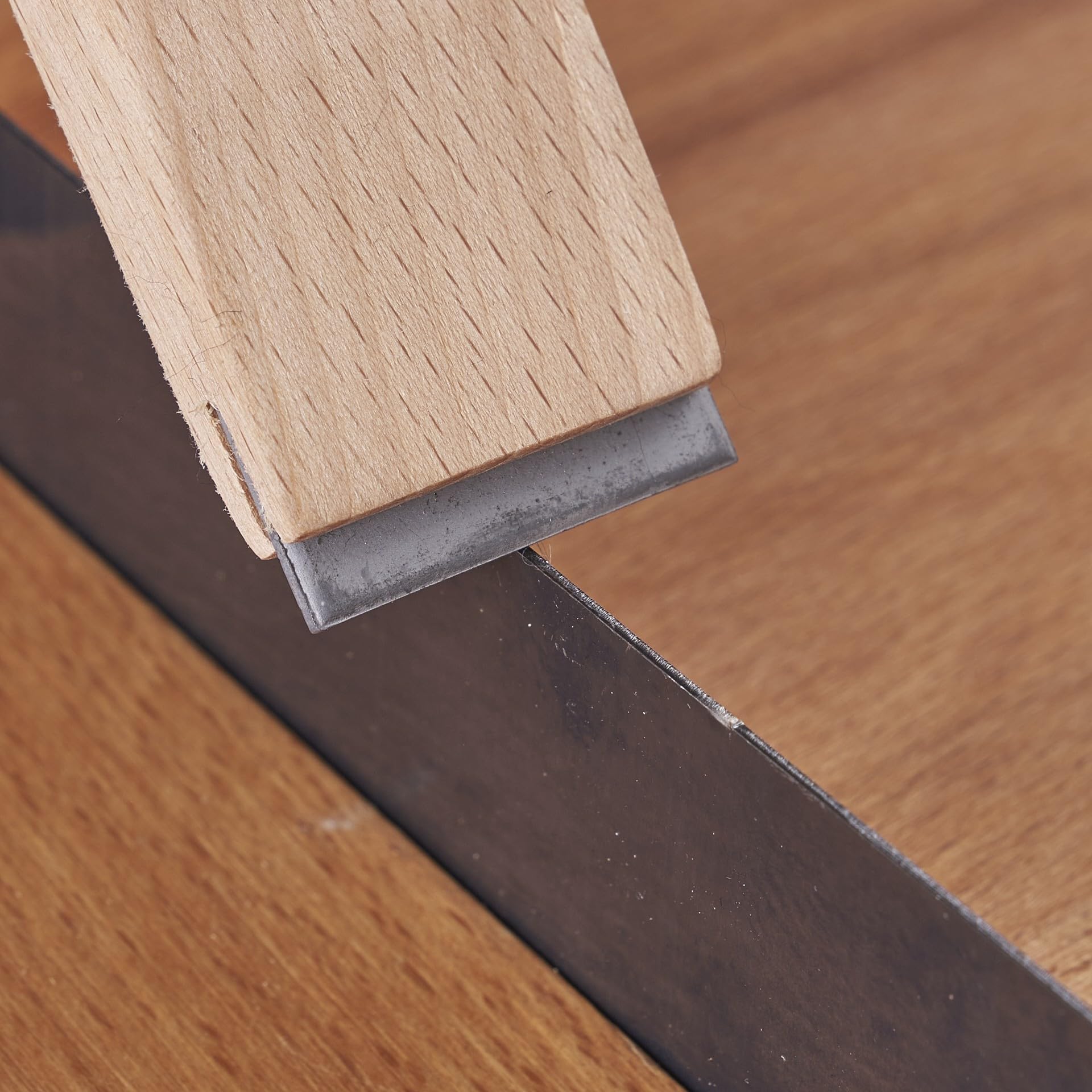 HERMIT TOOLS multi-shaped scrapers for small-space cabinetry, offers precise control.