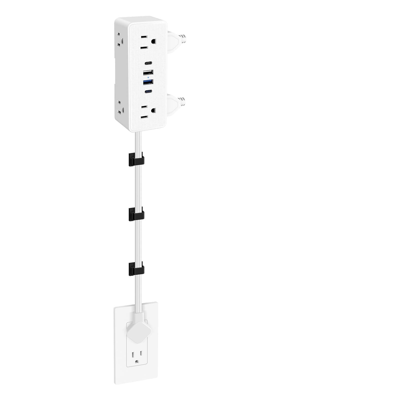 HEZI outlet extender mounted on wall behind sofa for easy access