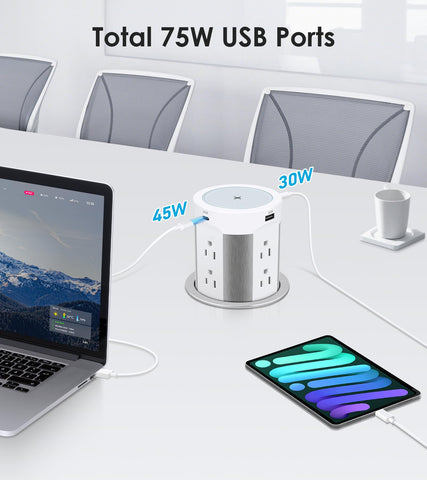 HEZI pop-out installed on an island kitchen, powering multiple devices