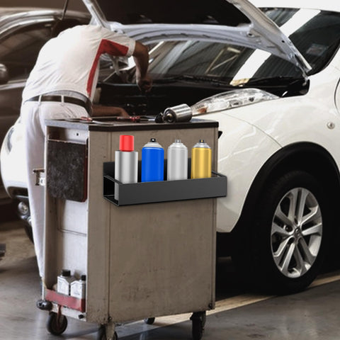 Garage workspace organization with magnetic can holders