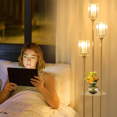HMVPL gold floor lamp upper shelf provides decor space while lighting.