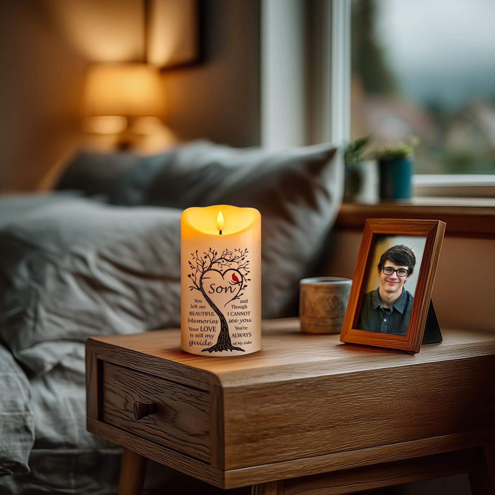 HN HAIINAA memorial candle close-up of printed words and butterflies