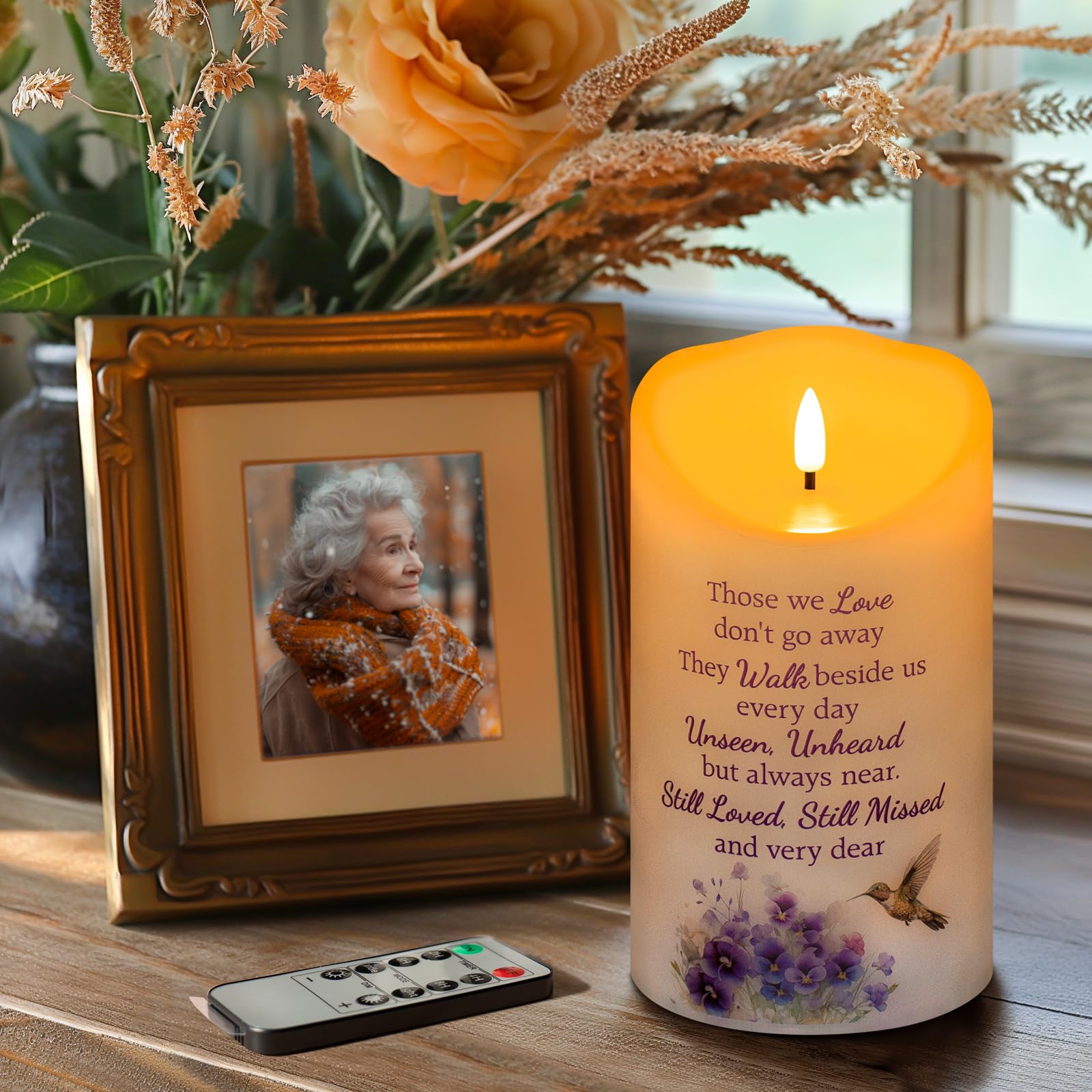 HN HAIINAA memorial candle close-up shows hummingbird design and lifelike wax texture.