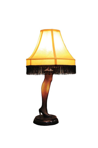 Holidays Leg Lamp with fringed shade lights up, adding festive glow to windows and holiday decor
