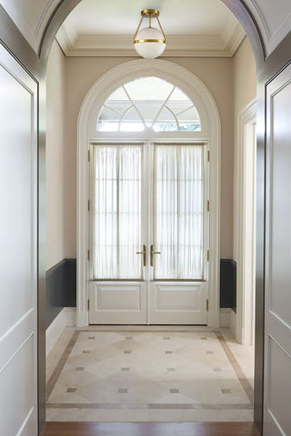HOLKIRT brass base detail adds a refined metallic touch