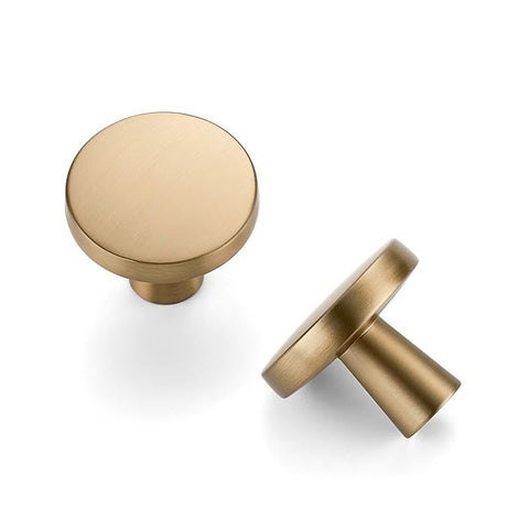 Home Edit champagne bronze knob round elevates cabinetry with timeless finish and smooth tactile feel.
