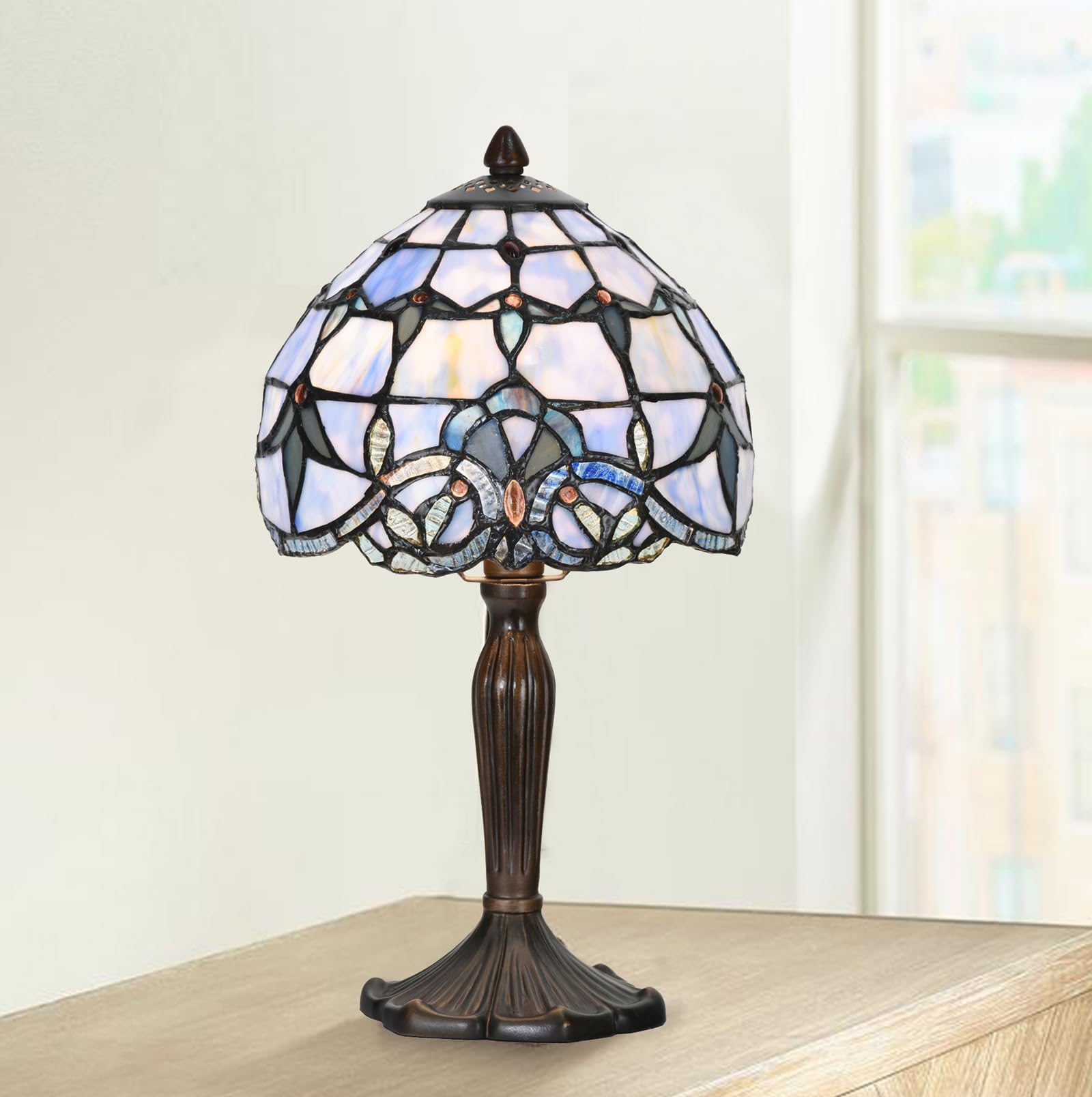 HomeBeauty antique bronze base providing stable, elegant support.