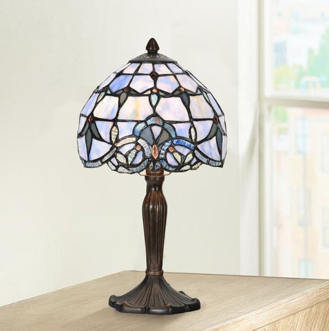 HomeBeauty antique bronze base providing stable, elegant support.