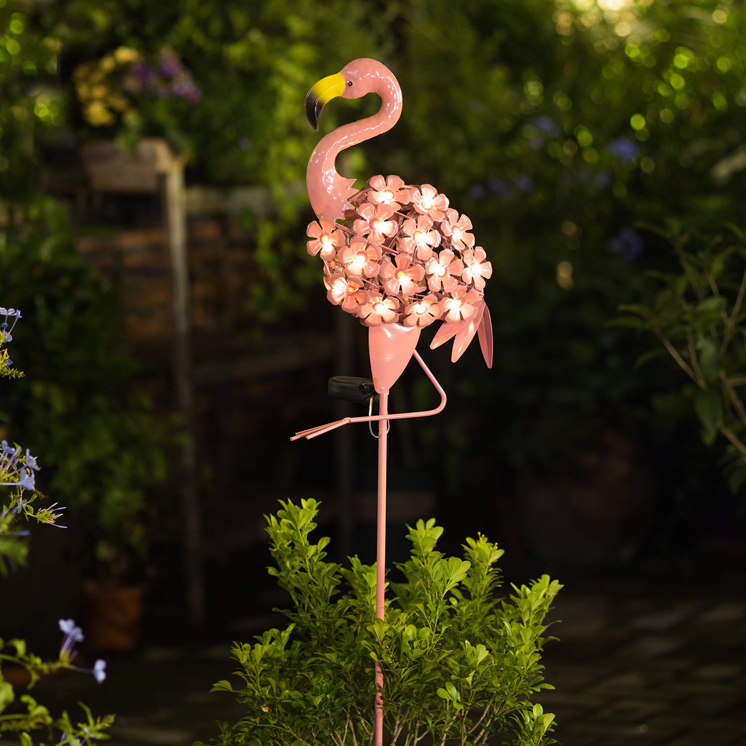 Homeimpro outdoor lawn flamingo ambiance light enhances curb appeal.