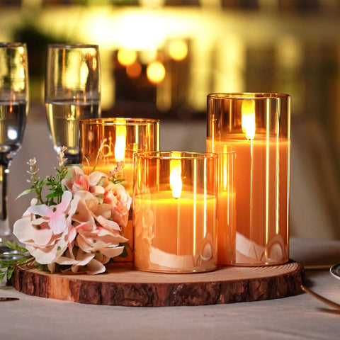 Homemory amber glass candle on dining table creates warm mood.