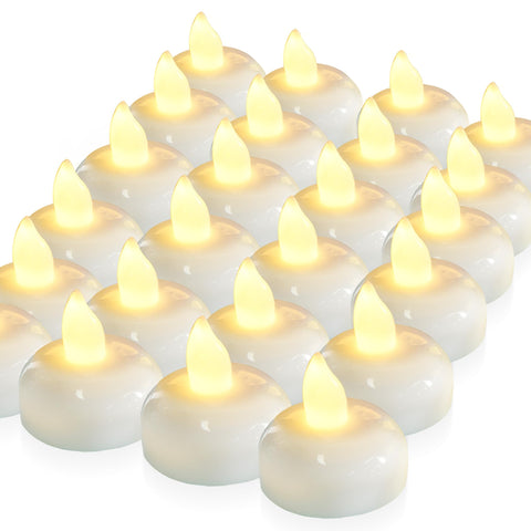 Homemory floating candles in a glass vase create warm, romantic ambient lighting.