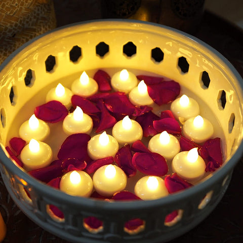 Homemory rose-petal floating tealight enhances spa and bath settings.