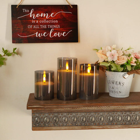 Homemory grey glass flameless candles packaging shows three-piece set and manual.