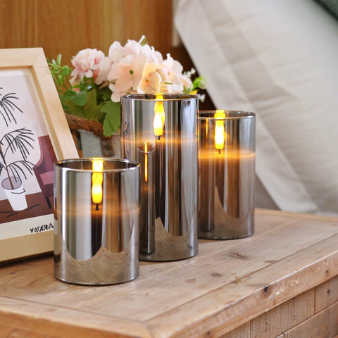 Homemory grey glass flameless candle demonstrates windproof design for indoor use.