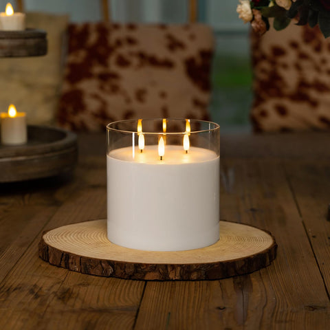 Homemory real wax candle appearance inside a clear glass holder.