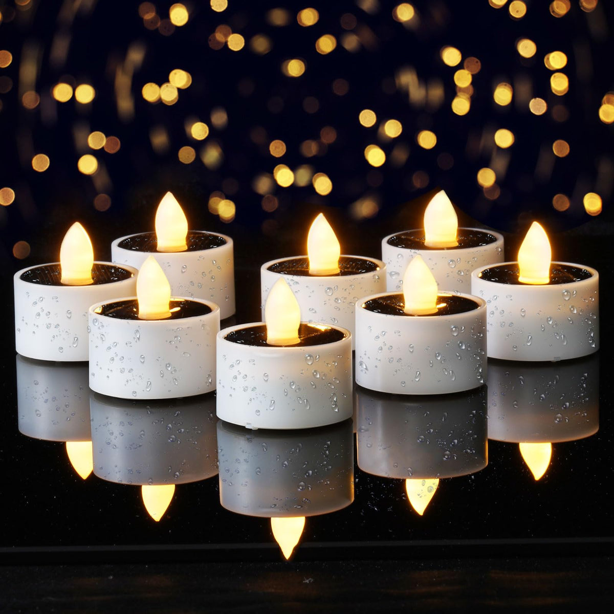 Homemory solar tea lights emit a soft outdoor glow for gardens and patios