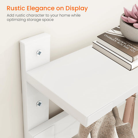 Homode entryway setup with keys and decor on the top shelf