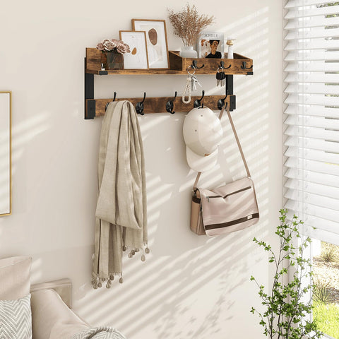 Homode wall-mount coat rack handles everyday items without floor clutter.