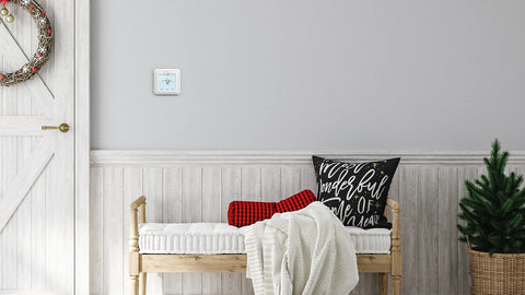 Honeywell RTH8560D blue backlit display clearly shows indoor temperature and humidity