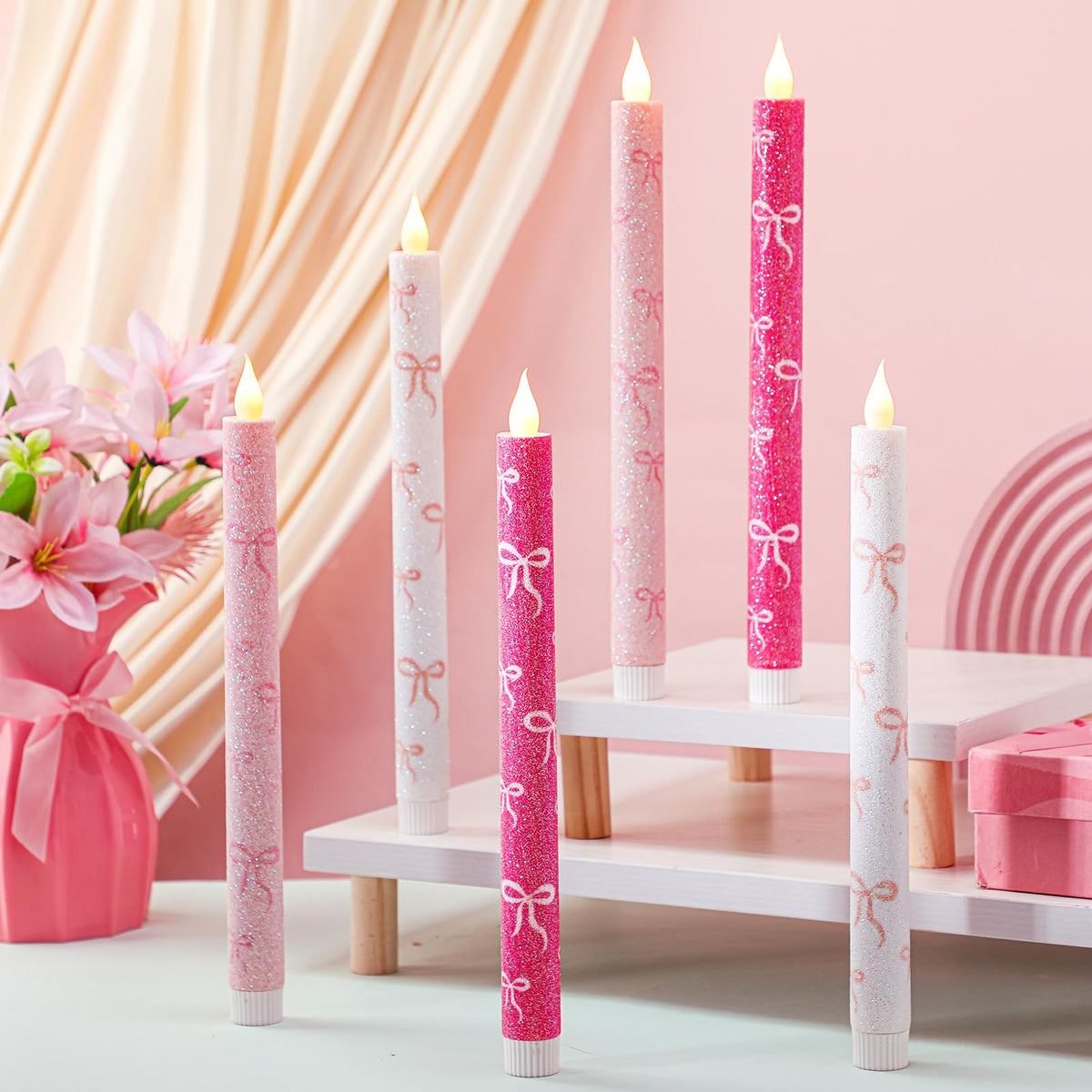 Honoson Valentines flameless candles with pink glitter bows create romantic table ambience.