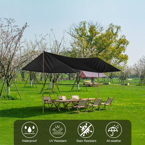 Honsaifau tarp with reinforced webbing loops secures shelter in windy conditions.